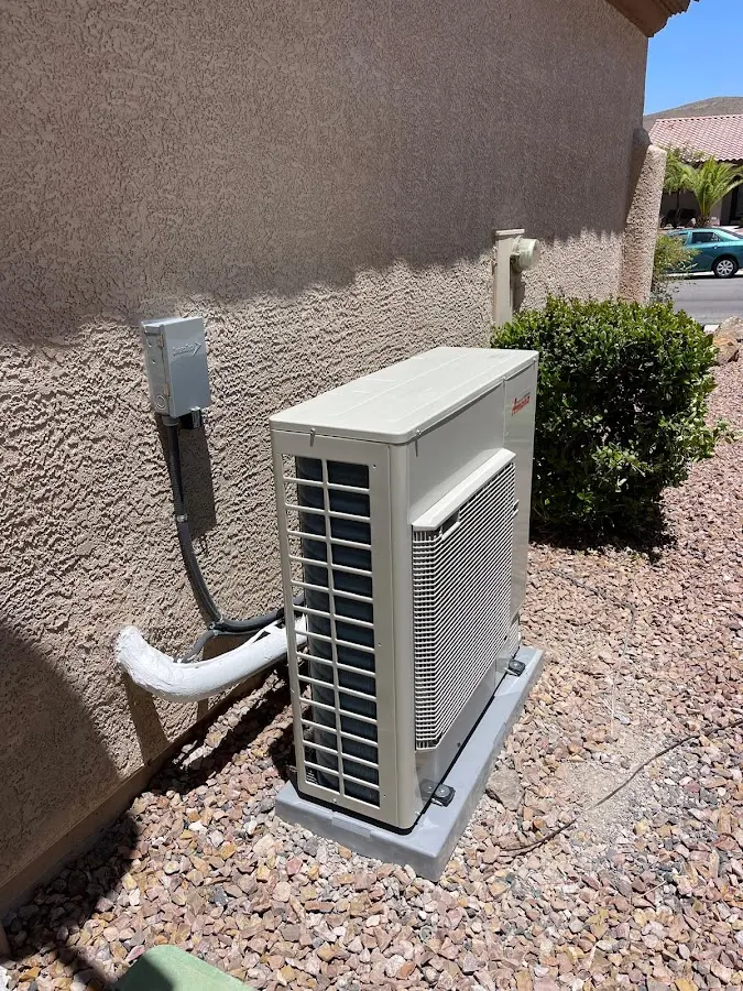 Residential air conditioning condenser unit in Earlimart