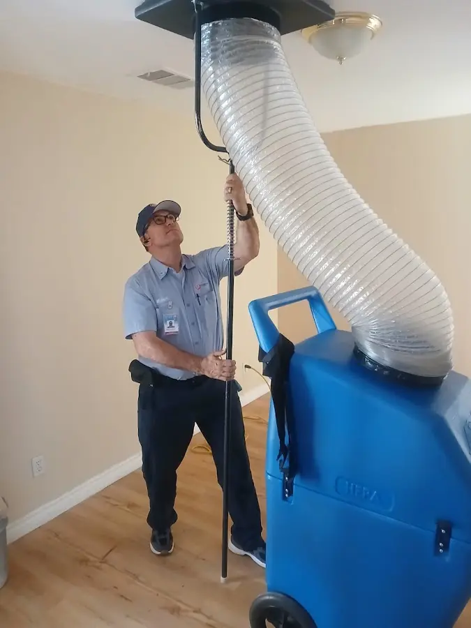 HVAC Installation technician using HEPA equipment in Earlimart